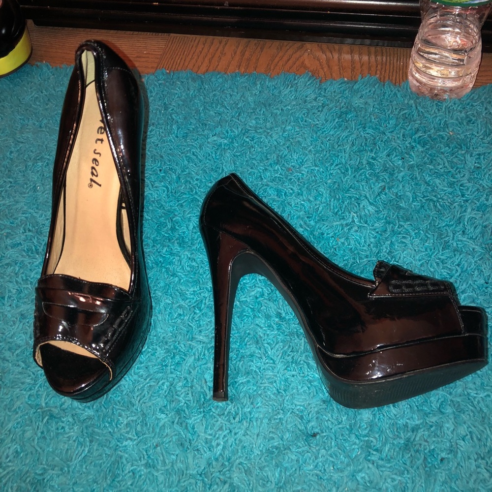 Shiny Black Heels.